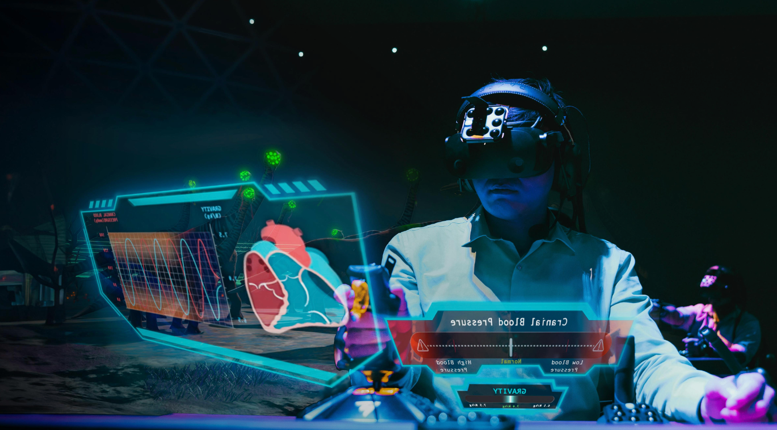 Person using a VR headset to interact with a holographic heart display.